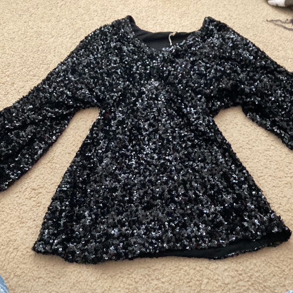 Never worn has shoulder padding